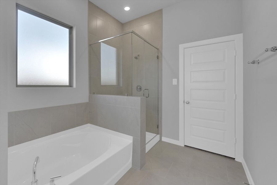Furnished interior view inside a new home in Sunterra 40, Katy (Image 10).
