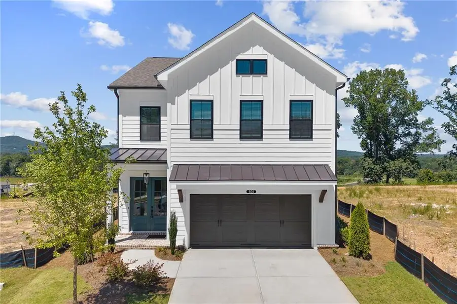 Front exterior of a new home in , Cumming, GA, highlighting curb appeal (Image 30).