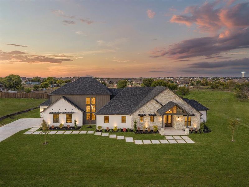 Front exterior of a new home in , Northlake, TX, highlighting curb appeal (Image 24).