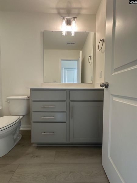 Furnished interior view inside a new home in Piney Woods Bluff, Columbia (Image 5).