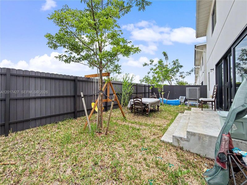 Exterior details and patio area of a home in , Florida City (Image 3).
