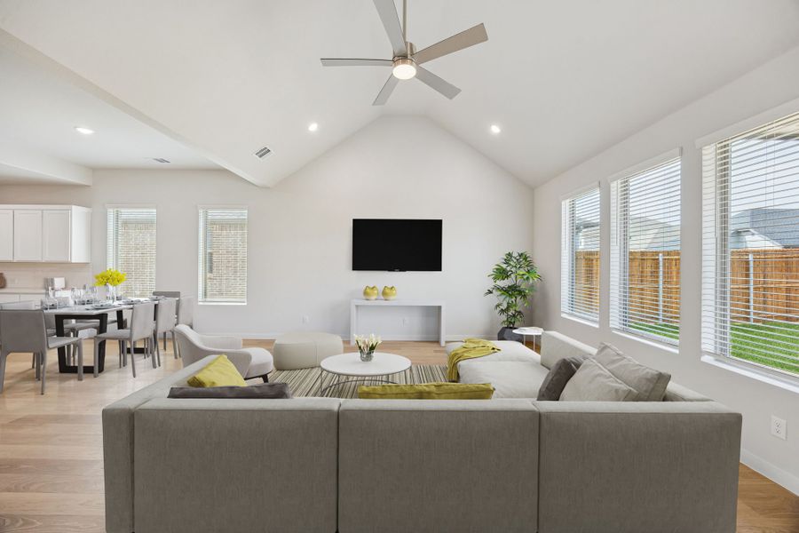 Living and Dining Room in the Stanley II home plan by Trophy Signature Homes – REPRESENTATIVE PHOTO