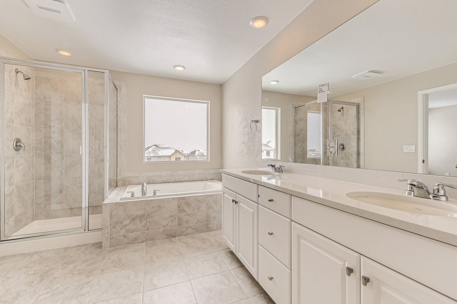Furnished interior view inside a new home in The Aurora Highlands, Aurora (Image 3).
