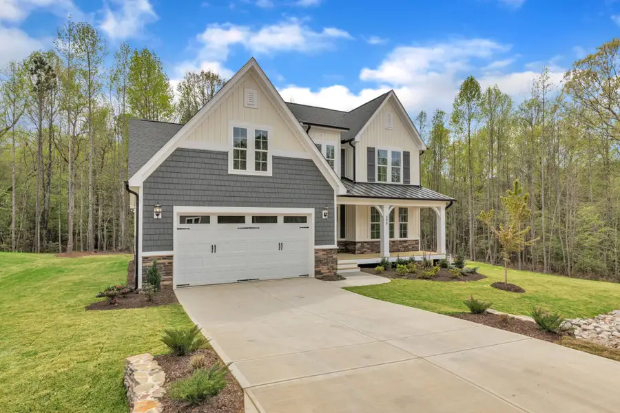 Representative exterior photo of a completed home built from the The Chandler by RobuckHomes in Baylee Ridge, Selma, NC (Image 39). Representative exterior photo of a completed home built from the The Chandler by RobuckHomes in Baylee Ridge, Selma, NC (Image 39).