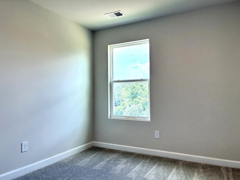 Spacious, unfurnished interior of a new home in Holly View, Greenville (Image 13).