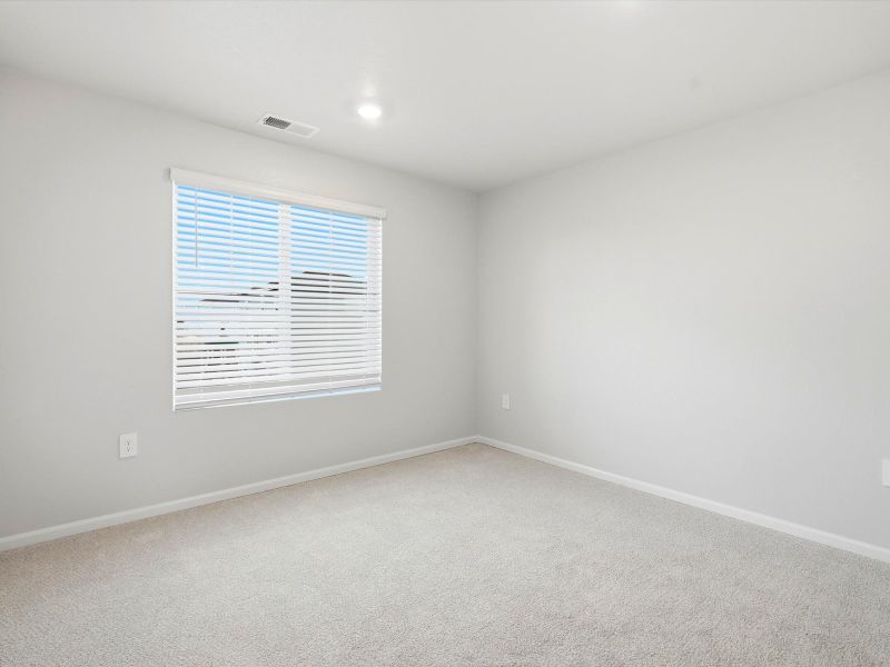 Spacious, unfurnished interior of a new home in Frontier Estates - The Trails Collection, Firestone (Image 11).