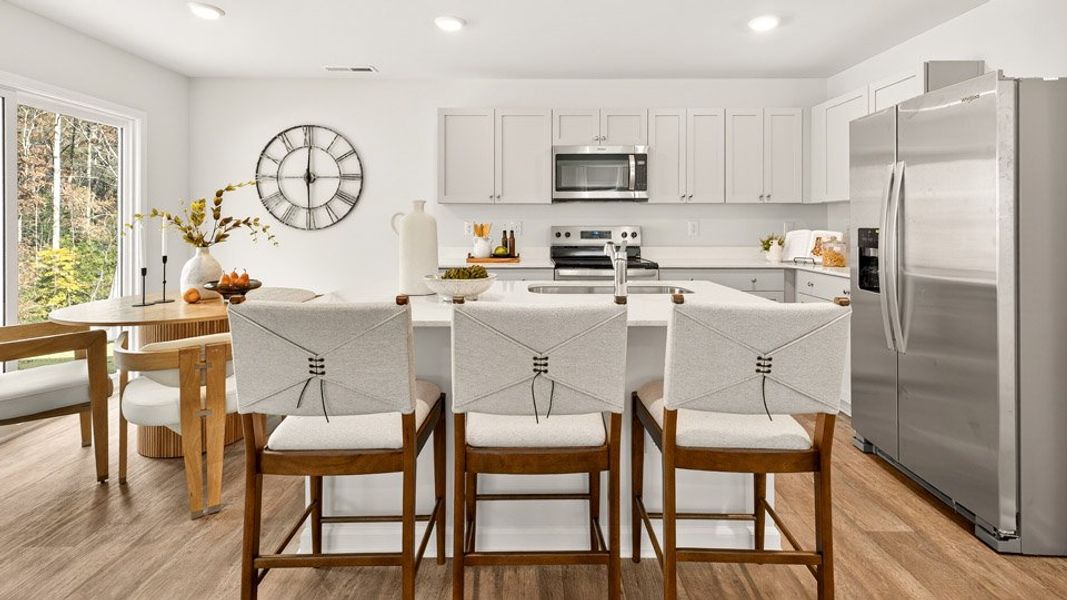 Representative furnished interior of a home built from the OLIVER by D.R. Horton in Barwell Park, Raleigh (Image 11).