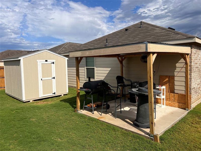 Exterior details and patio area of a home in Rancho Canyon: Cottage Collection, Haslet (Image 2). Exterior details and patio area of a home in Rancho Canyon: Cottage Collection, Haslet (Image 2).