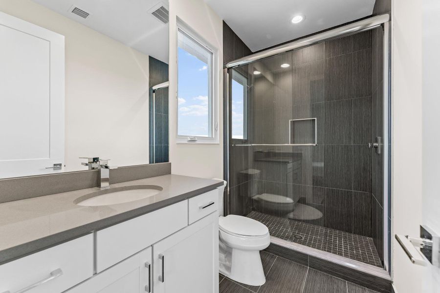 Furnished interior view inside a new home in Coral Isles at Avenir, Palm Beach Gardens (Image 11).