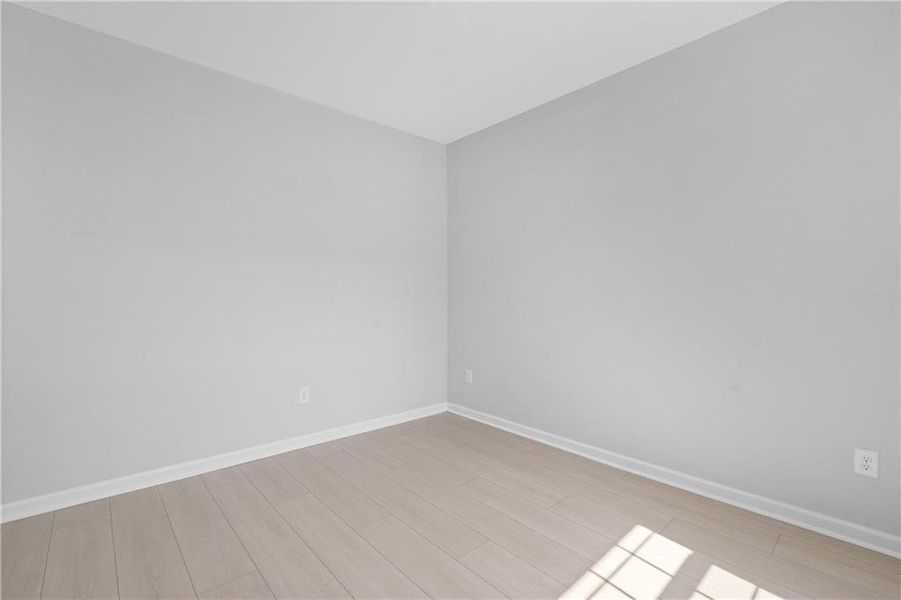 Spacious, unfurnished interior of a new home in , Gray (Image 57).