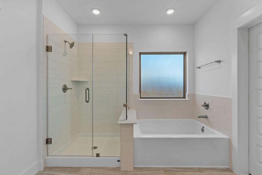 Designed as a peaceful escape within the home, this relaxing primary bath delivers the comfort, style, and everyday luxury today’s buyers love.