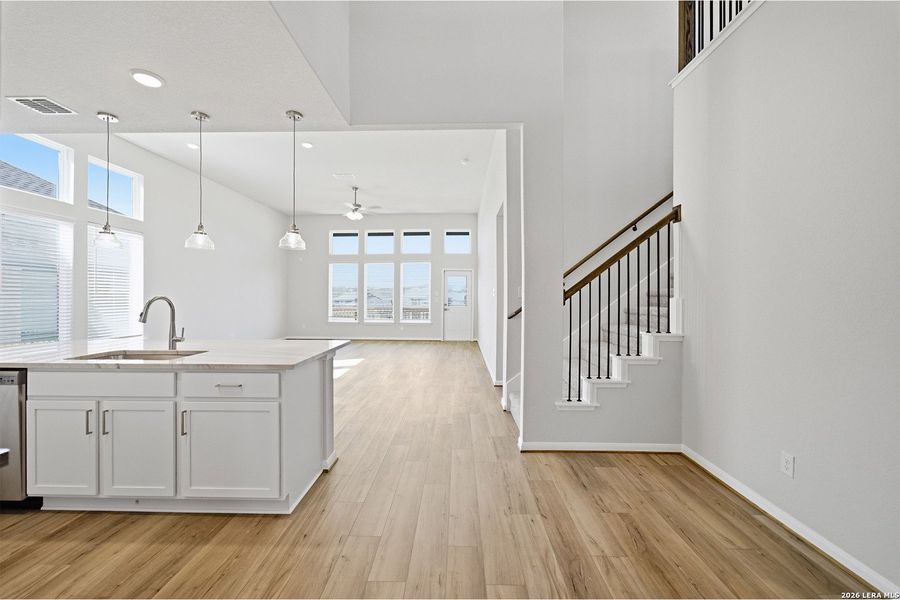 Spacious, unfurnished interior of a new home in The Woodlands at Medina Hills, Mico (Image 32).