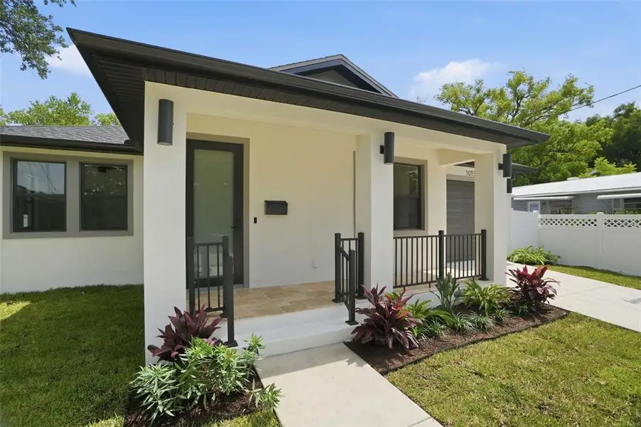 Exterior details and patio area of a home in , Tampa (Image 27).
