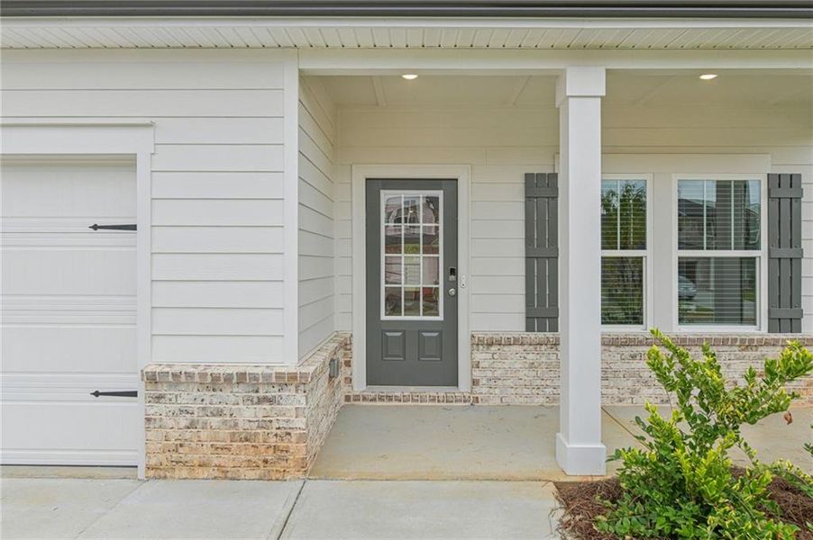 Exterior details and patio area of a home in Preserve at Mountain Creek, Pendergrass (Image 25).