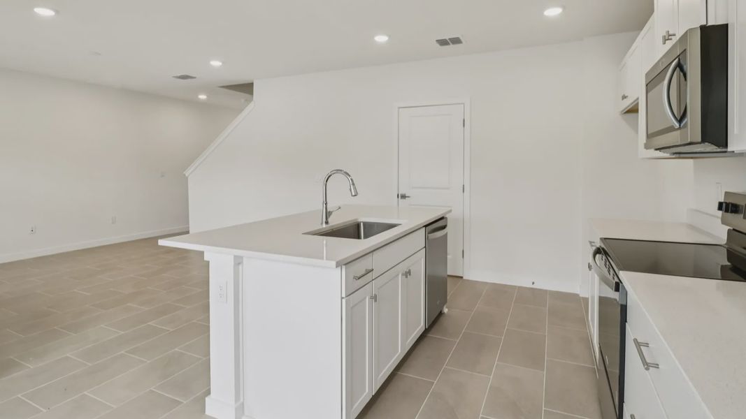 Furnished interior view inside a new home in Cyrene at Harmony, St. Cloud (Image 11).