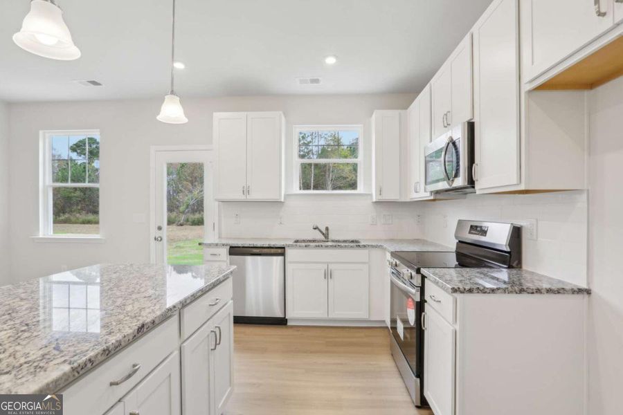 Furnished interior view inside a new home in Stonebridge North, Macon (Image 3).