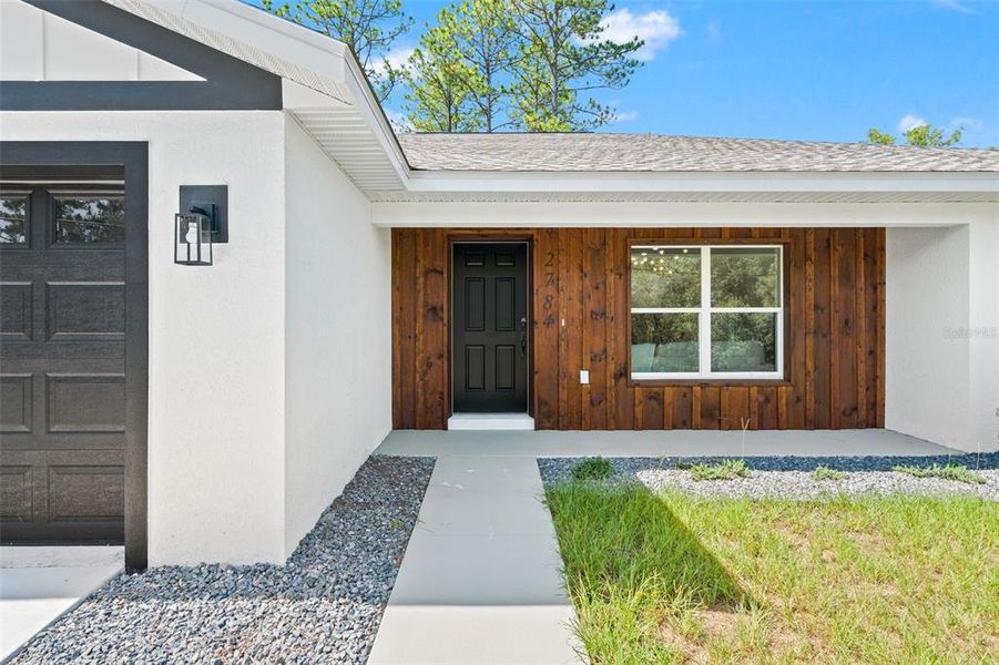 Exterior details and patio area of a home in , Citrus Springs (Image 32).