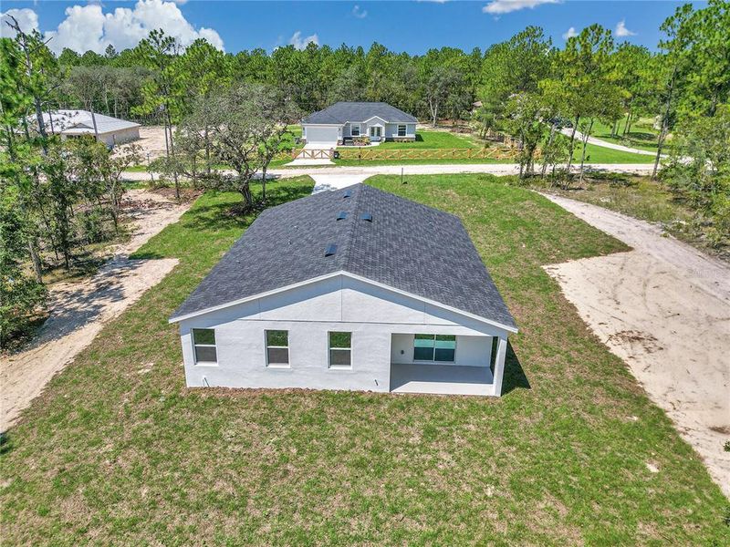 Front exterior of a new home in , Dunnellon, FL, highlighting curb appeal (Image 27).