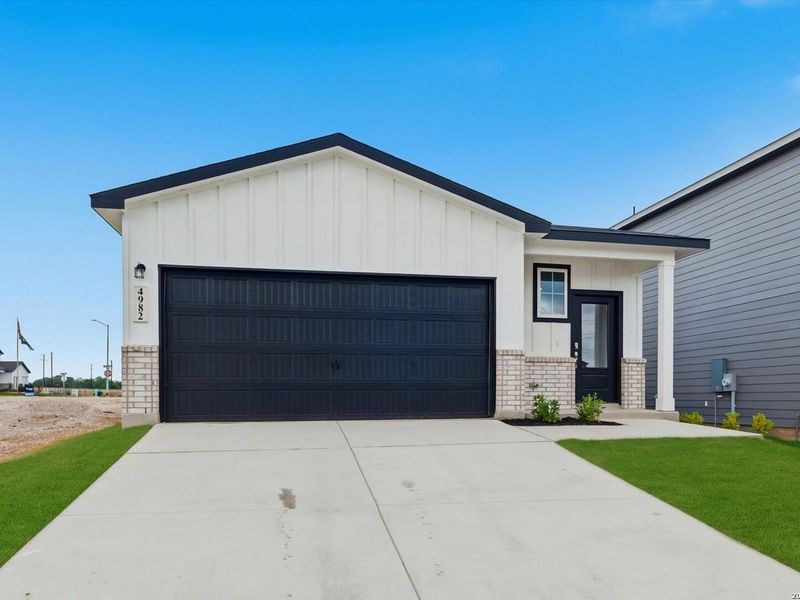 Front exterior of a new home in Agave, San Antonio, TX, highlighting curb appeal (Image 17). Front exterior of a new home in Agave, San Antonio, TX, highlighting curb appeal (Image 17).