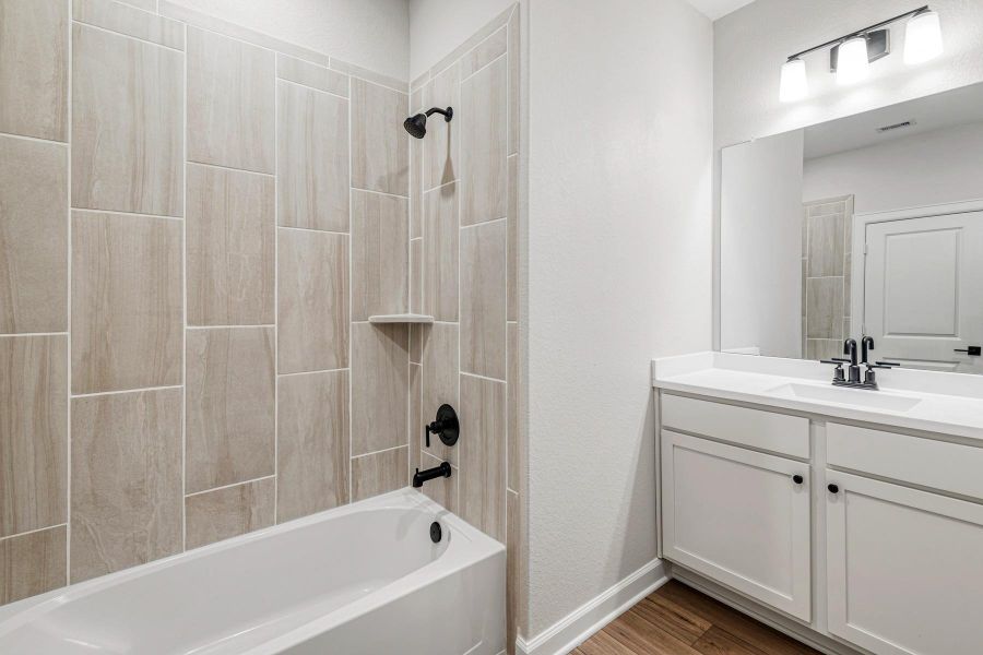 Furnished interior view inside a new home in Sweetwater Ridge, Conroe (Image 8).