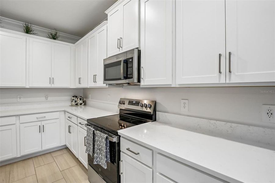 Furnished interior view inside a new home in Prosperity Lakes Active Adult, Parrish (Image 16).