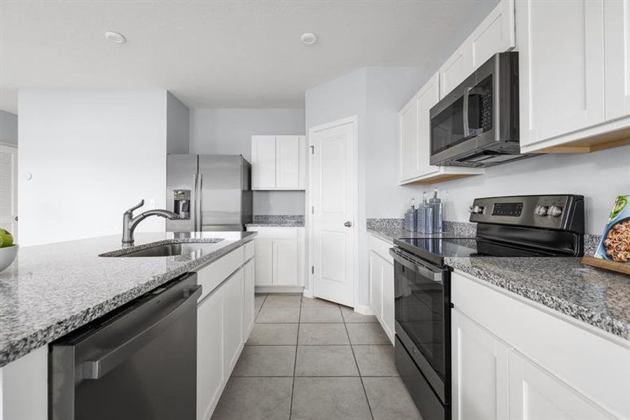 Representative furnished interior of a home built from the Mahogany by Ryan Homes in Touchstone, Lakeland (Image 4).