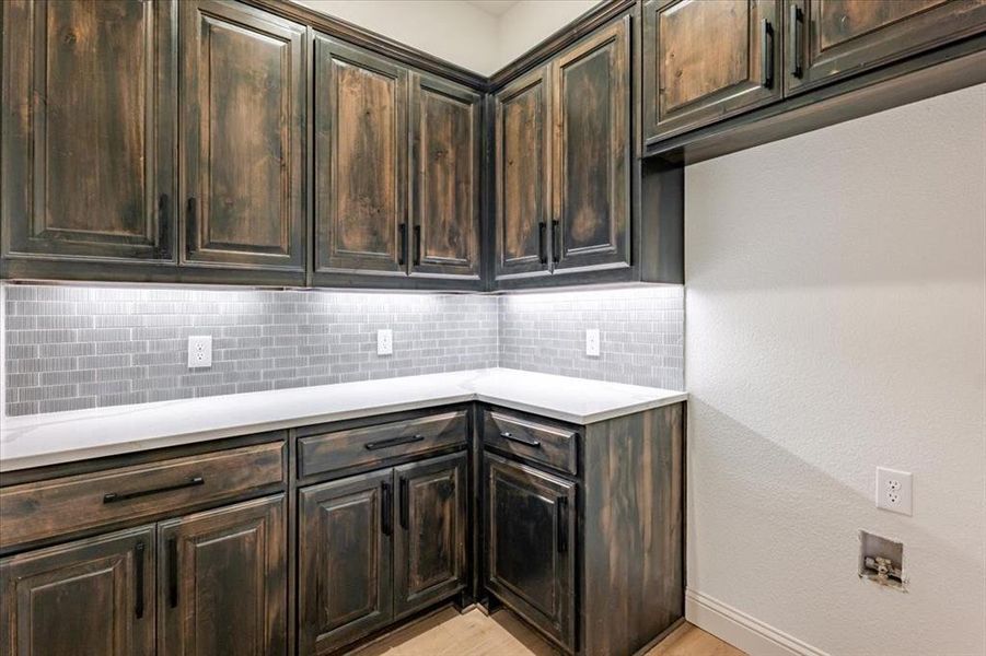 Room for refrigerator or freezer with waterline installed. Room for refrigerator or freezer with waterline installed.