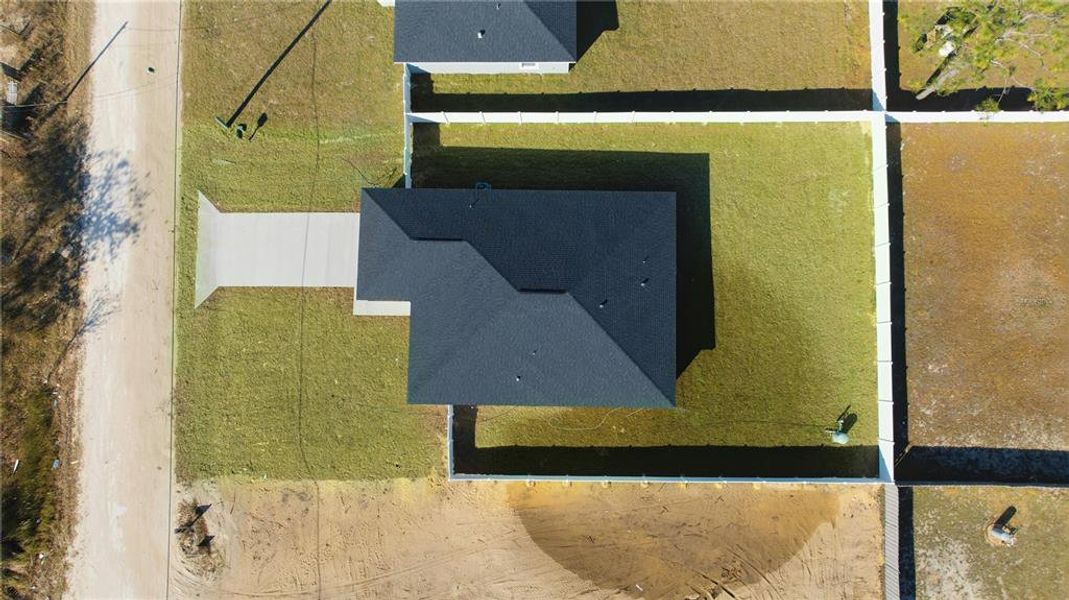 Front exterior of a new home in , Ocala, FL, highlighting curb appeal (Image 16).