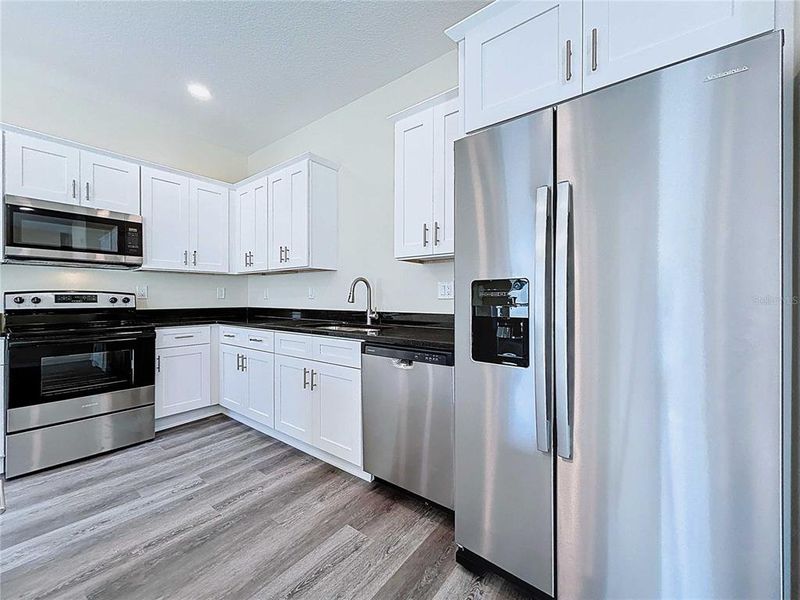 Furnished interior view inside a new home in , Tampa (Image 12). Furnished interior view inside a new home in , Tampa (Image 12).