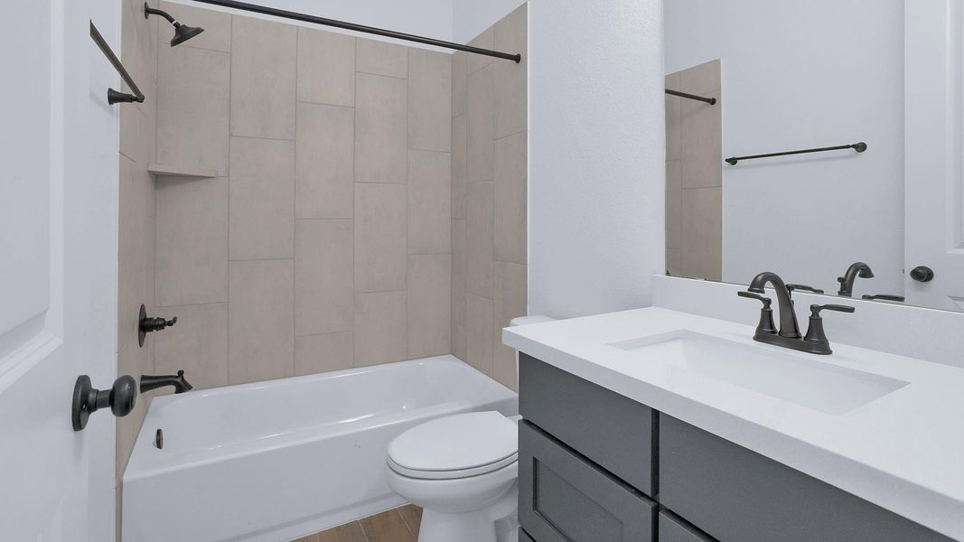 Furnished interior view inside a new home in Bridgeland 55', Cypress (Image 3). Furnished interior view inside a new home in Bridgeland 55', Cypress (Image 3).