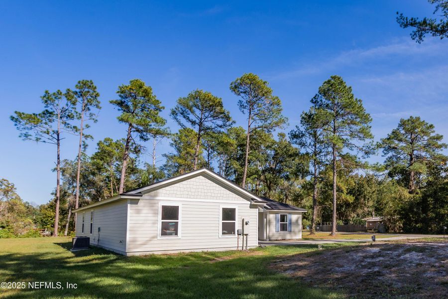 Exterior details and patio area of a home in , Satsuma (Image 22). Exterior details and patio area of a home in , Satsuma (Image 22).