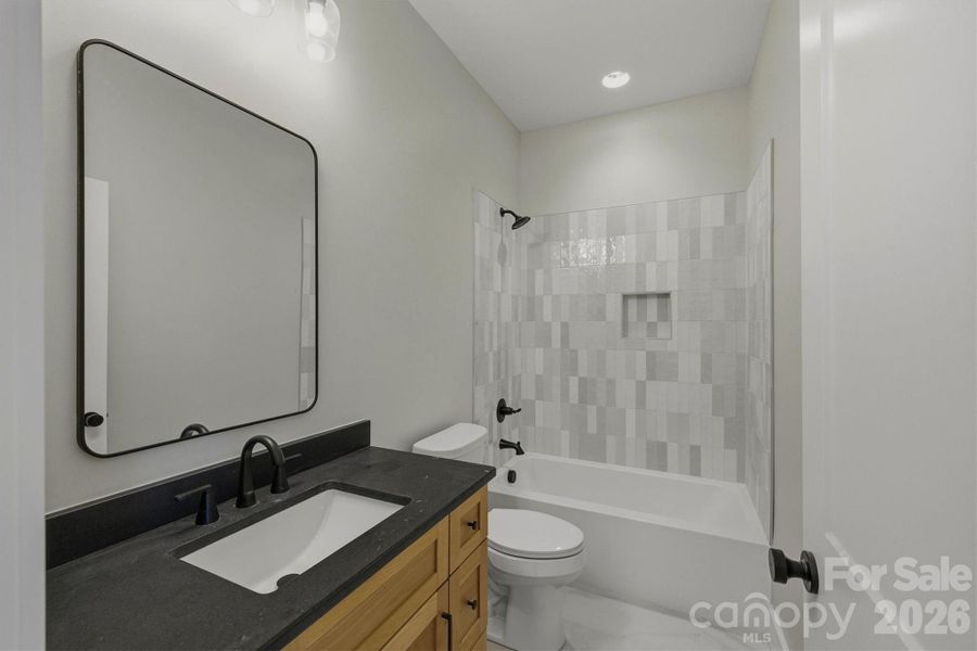 Furnished interior view inside a new home in , Valdese (Image 5).