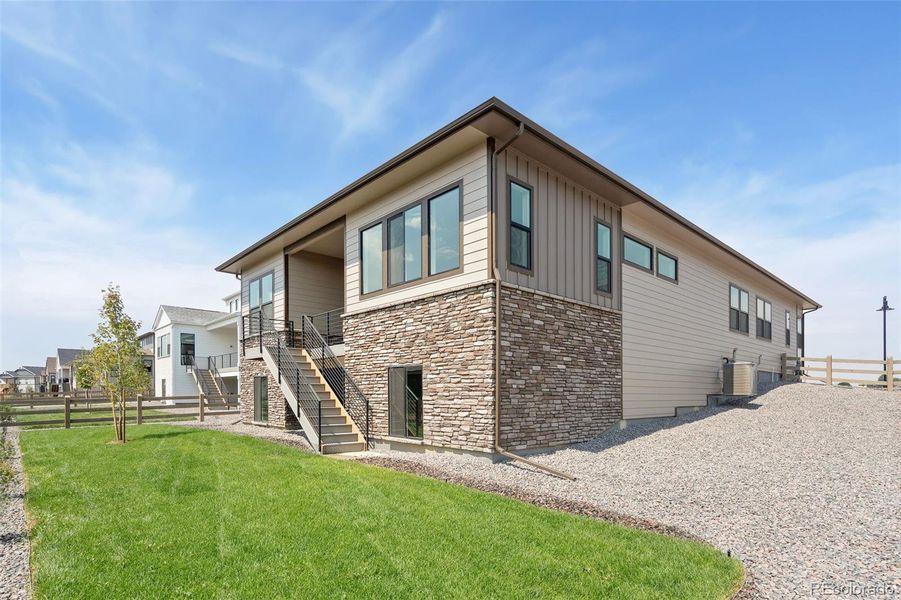Exterior details and patio area of a home in Kitchel Lake at Serratoga Falls, Timnath (Image 3).
