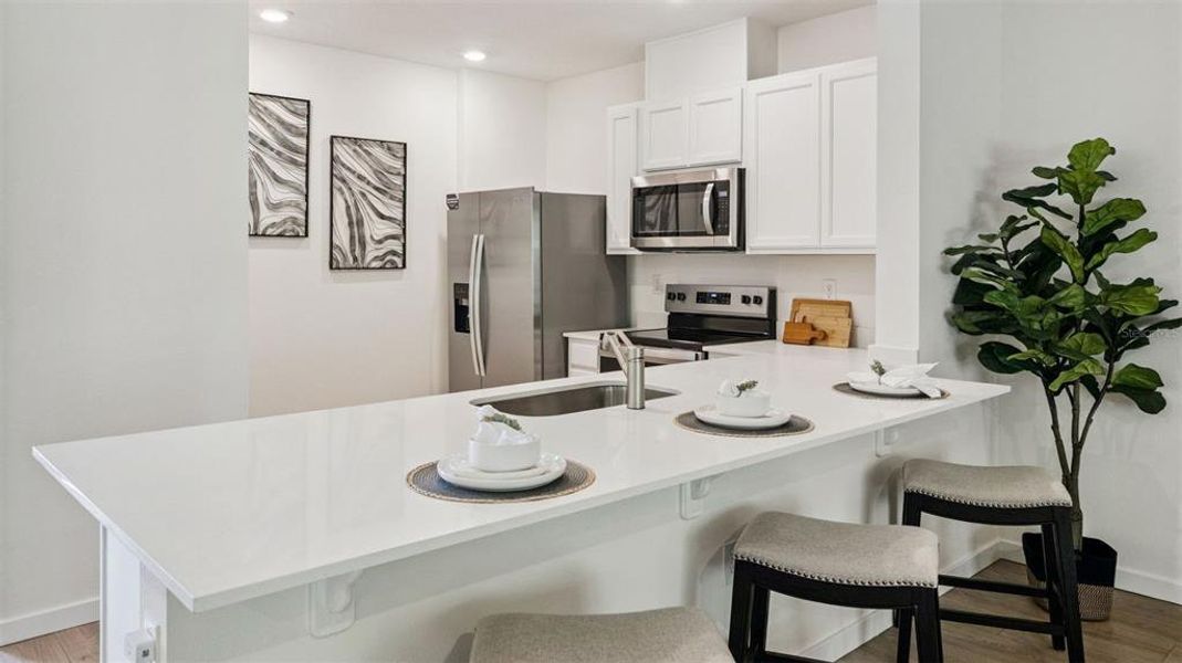 Furnished interior view inside a new home in Oak Pointe, Apopka (Image 8).