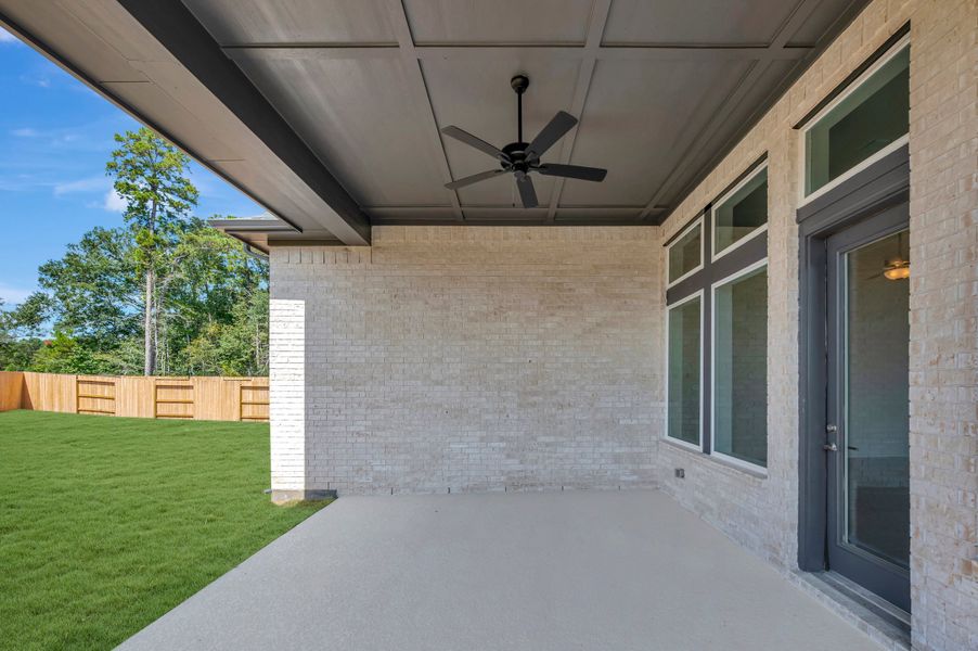 Exterior details and patio area of a home in ARTAVIA - Reserve Collection, Conroe (Image 4).