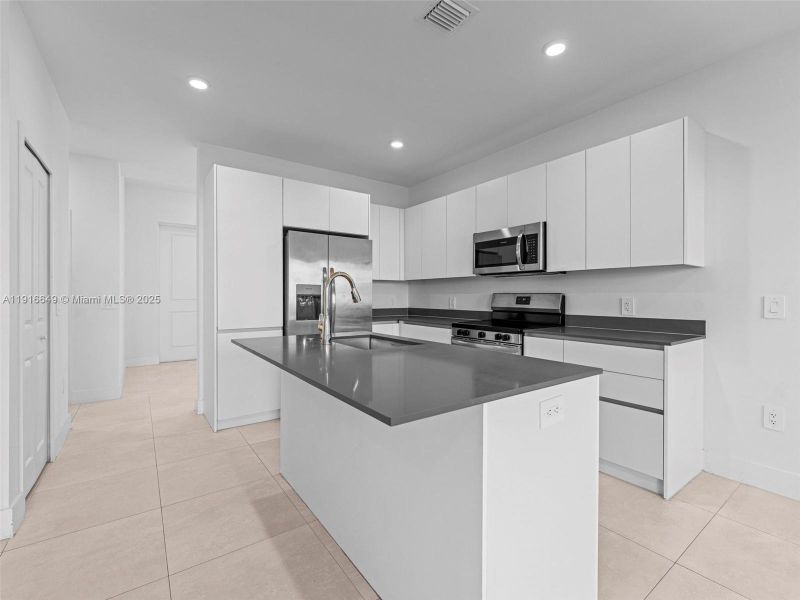 Furnished interior view inside a new home in , Homestead (Image 7). Furnished interior view inside a new home in , Homestead (Image 7).