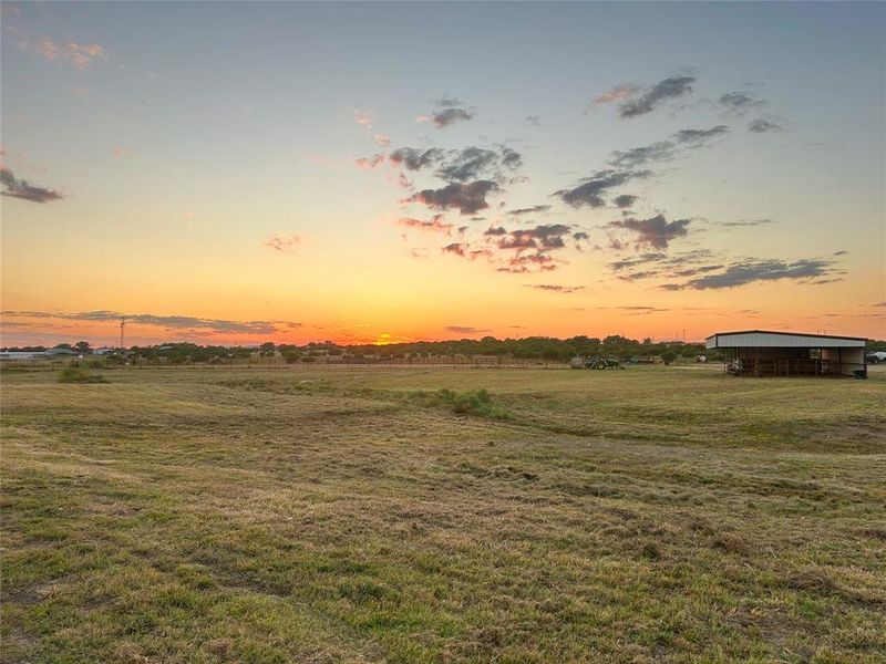 View of grassy yard featuring a view of countryside View of grassy yard featuring a view of countryside