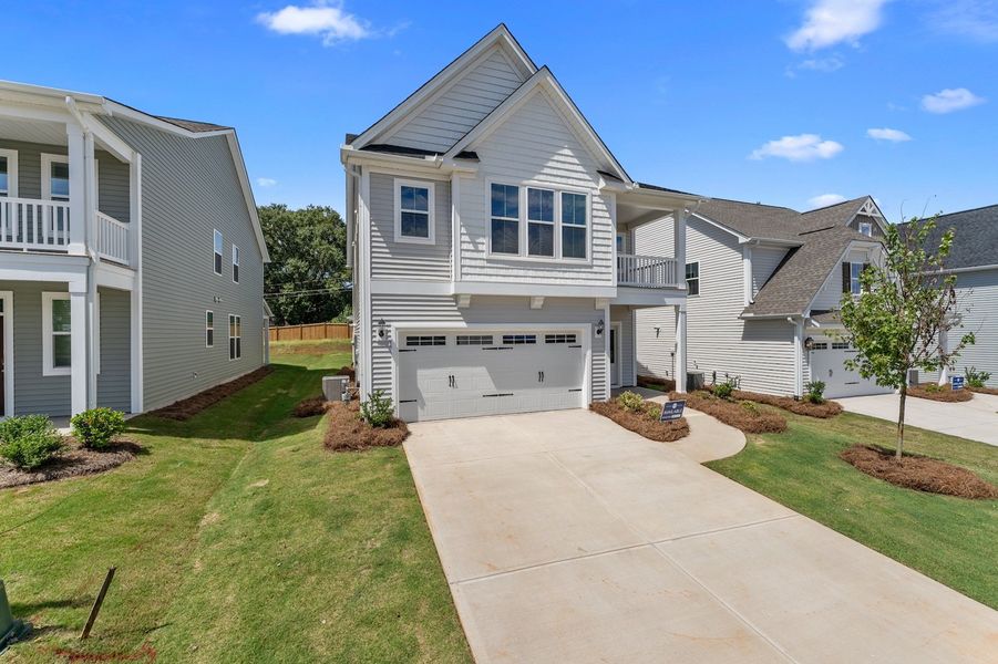 Front exterior of a new home in Landmark Commons, Boiling Springs, SC, highlighting curb appeal (Image 18). Front exterior of a new home in Landmark Commons, Boiling Springs, SC, highlighting curb appeal (Image 18).