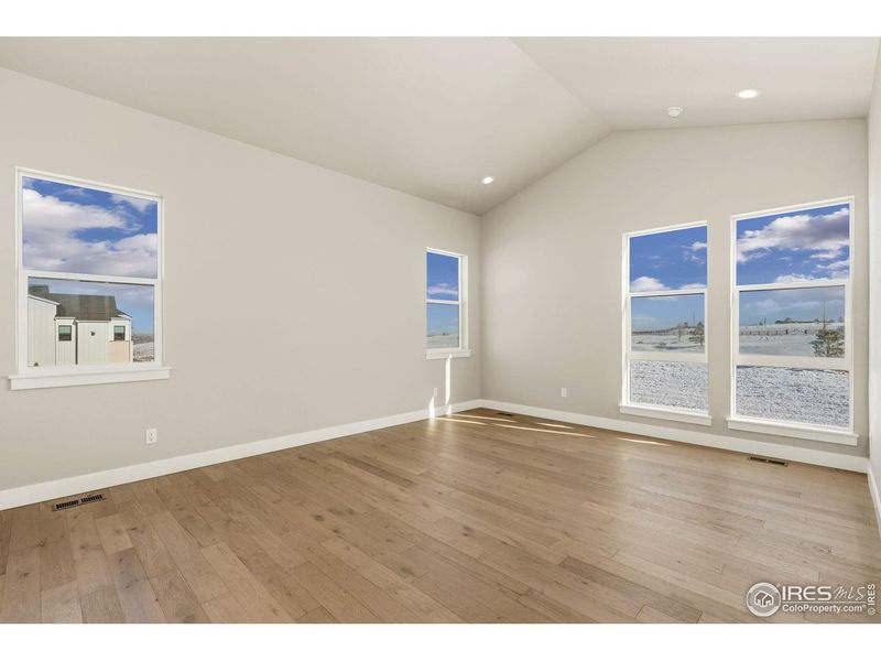 Spacious, unfurnished interior of a new home in The Fairways at RainDance, Windsor (Image 11).