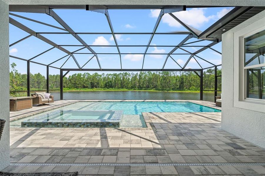 Front exterior of a new home in Whispering Oaks Preserve, Wesley Chapel, FL, highlighting curb appeal (Image 29).