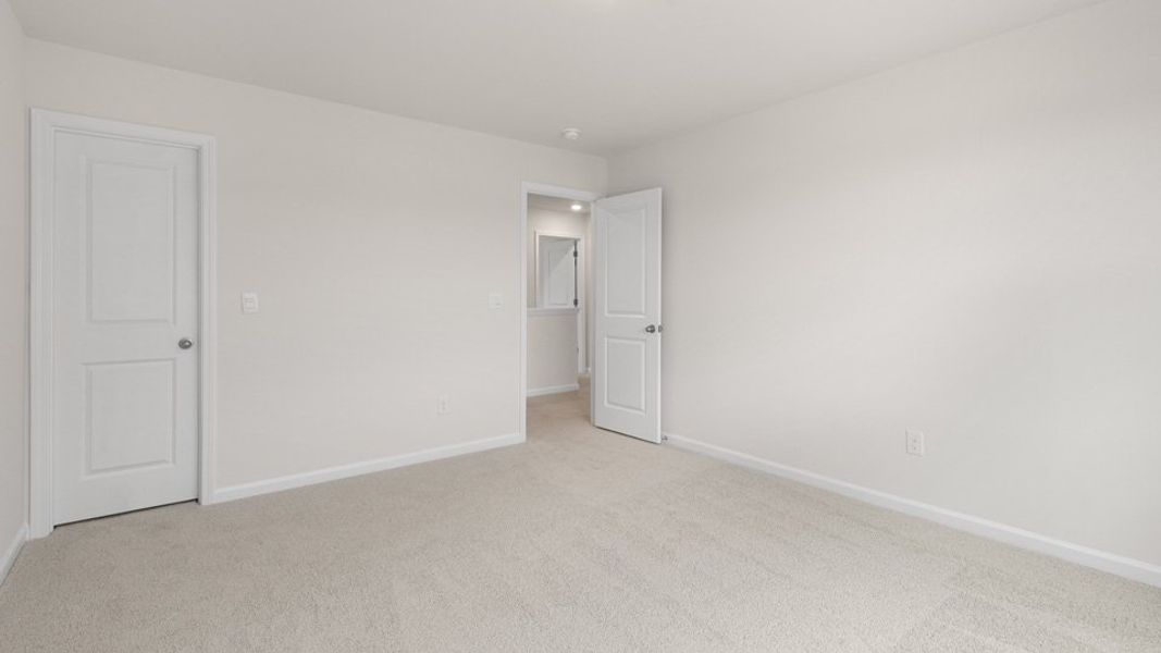 Spacious, unfurnished interior of a new home in The Reserve at Stoney Creek, Whitsett (Image 24).