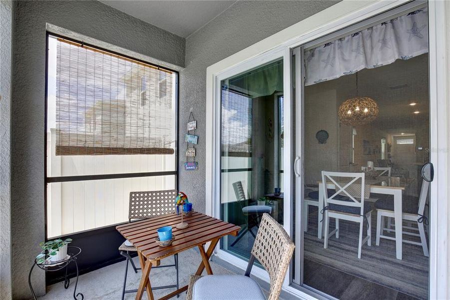 Exterior details and patio area of a home in Windrose, Apopka (Image 3).
