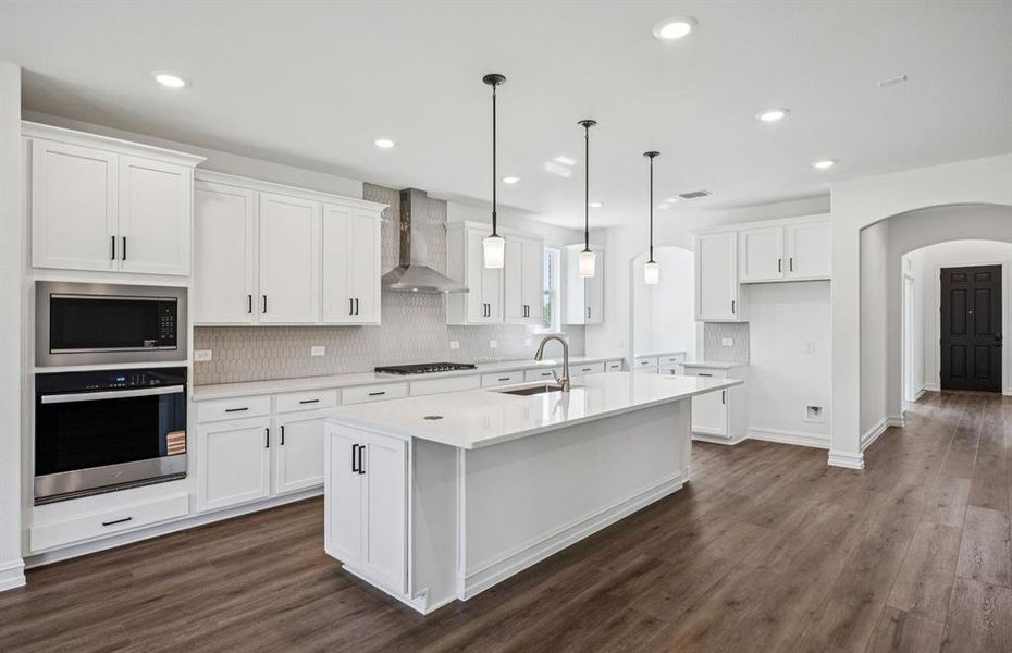 High-end gourmet kitchen with premium finishes and upgraded appliances High-end gourmet kitchen with premium finishes and upgraded appliances