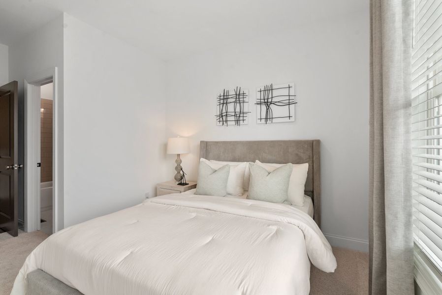 Representative furnished interior of a home built from the The Oleander by The Providence Group in Market Square at Sawnee Village, Cumming (Image 41).