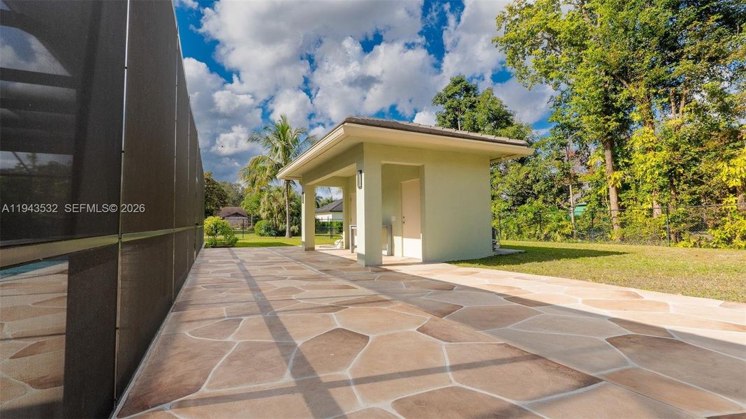 Exterior details and patio area of a home in , Parkland (Image 34).