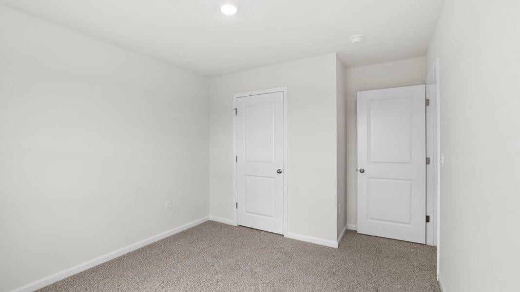 Spacious, unfurnished interior of a new home in Treemont Commons, Wellford (Image 31).