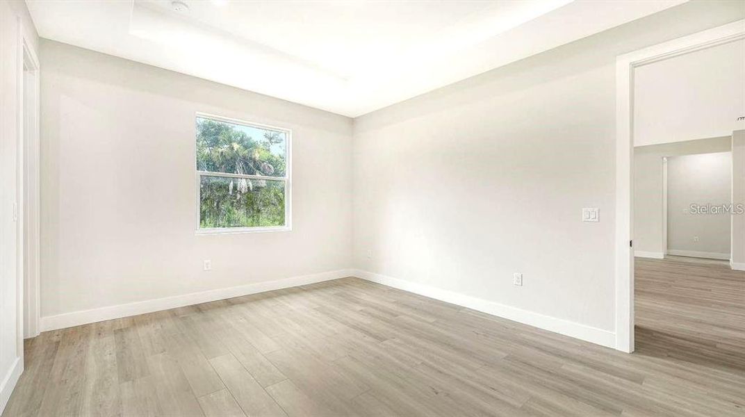 Spacious, unfurnished interior of a new home in , Port Charlotte (Image 15).