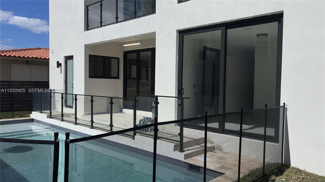 Exterior details and patio area of a home in , Miami (Image 3).