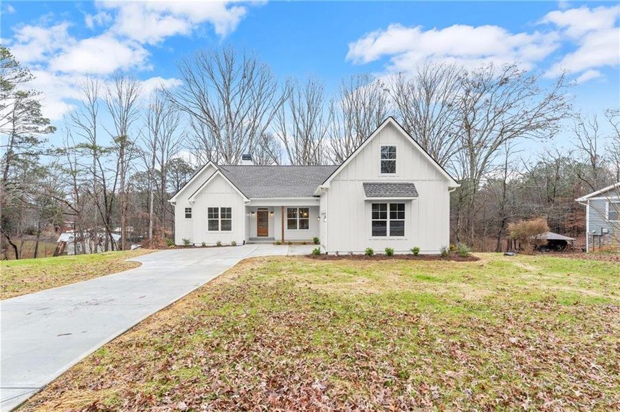 Front exterior of a new home in , Waleska, GA, highlighting curb appeal (Image 22). Front exterior of a new home in , Waleska, GA, highlighting curb appeal (Image 22).