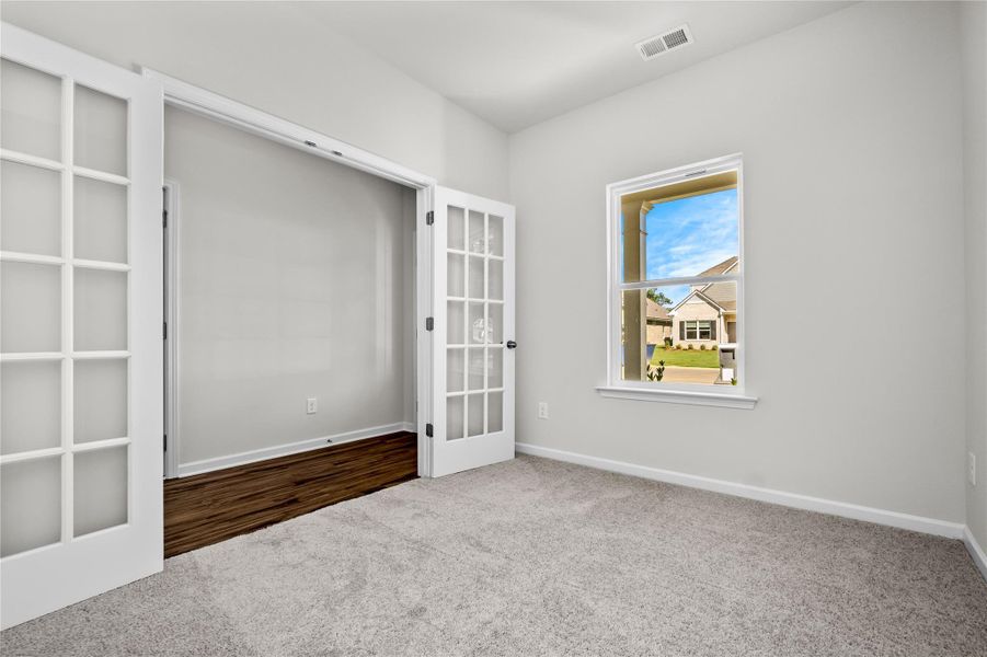 The Coleman- Study with French doors. Home under construction, photo used for illustrative purposes only, colors and options will vary. The Coleman- Study with French doors. Home under construction, photo used for illustrative purposes only, colors and options will vary.